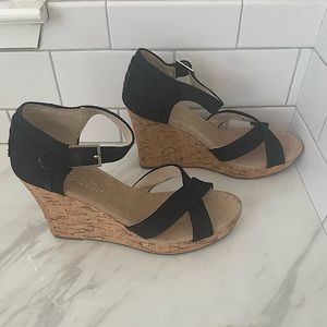 Tom’s strappy wedge, black canvas cork. Wome’s 7.5